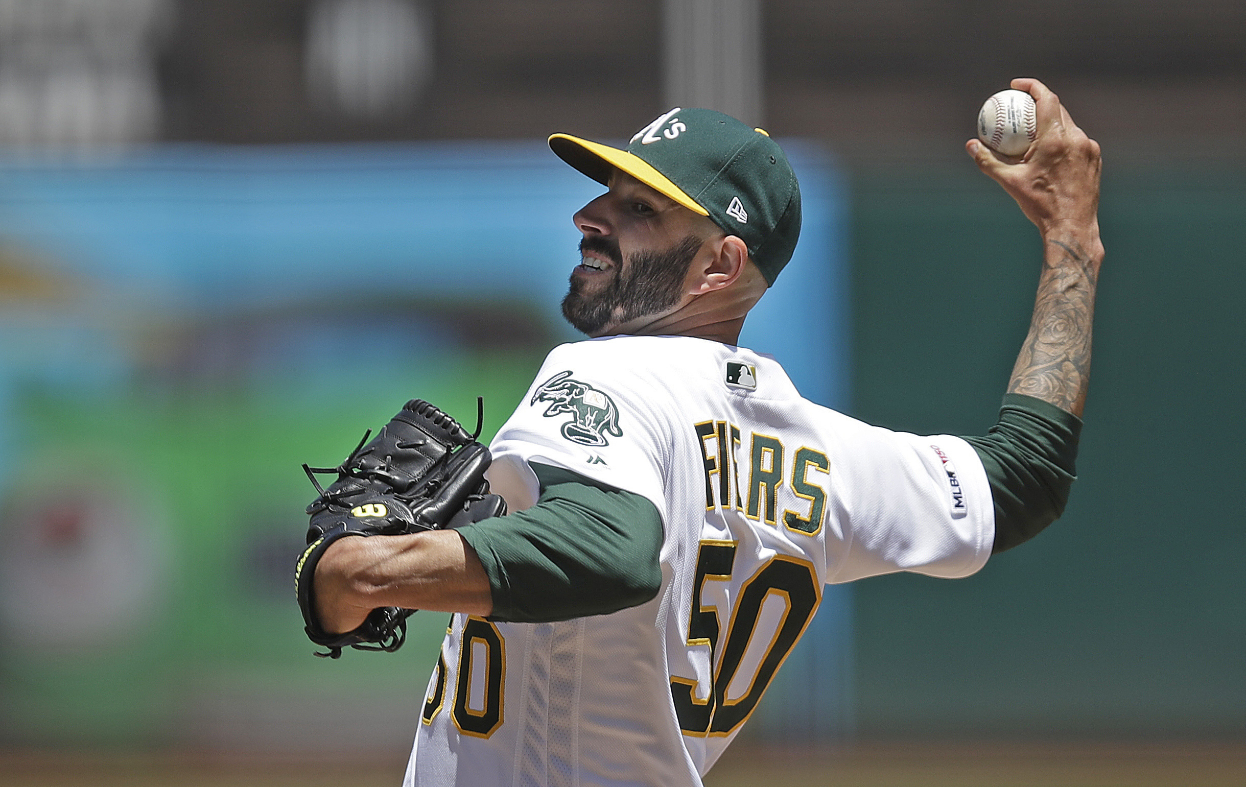 Friendly to Fiers: A's pitcher gets cheers in spring game