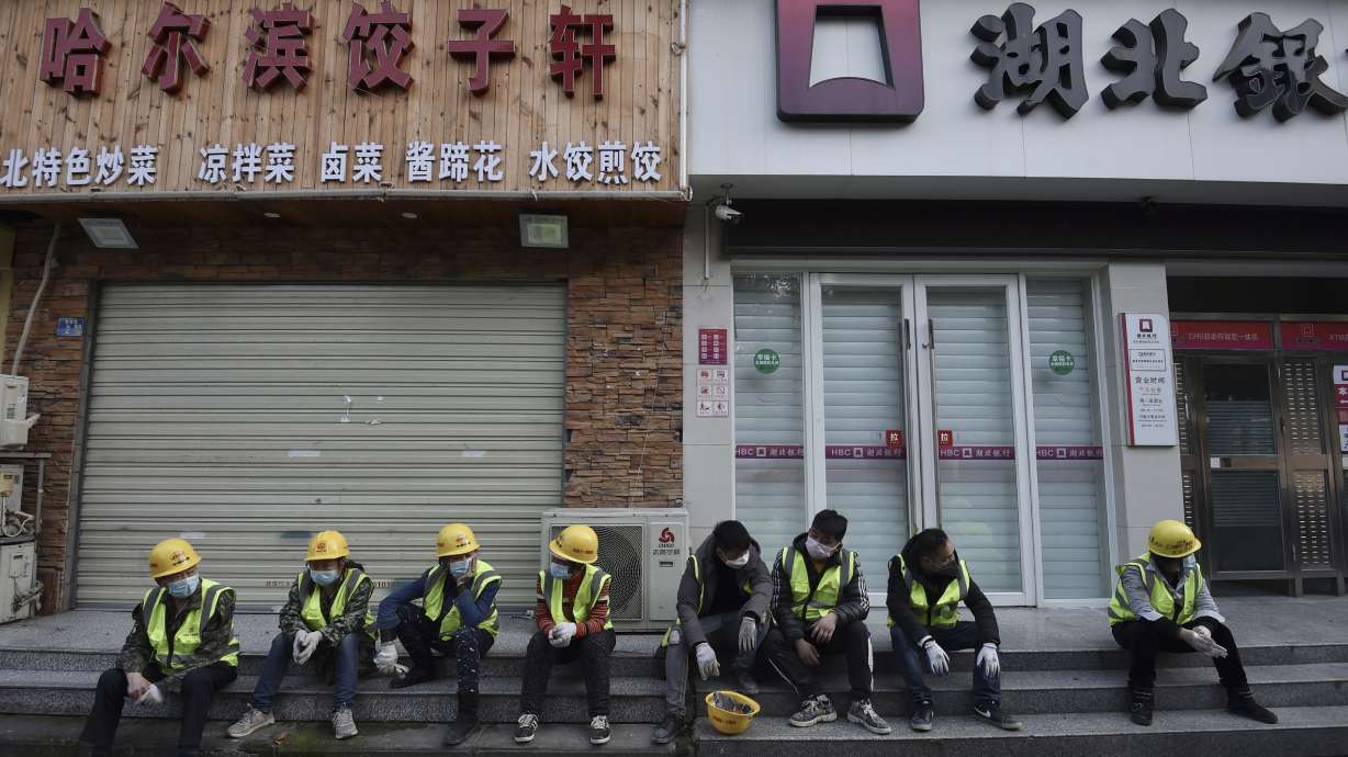 China promises companies aid, global virus cases rise