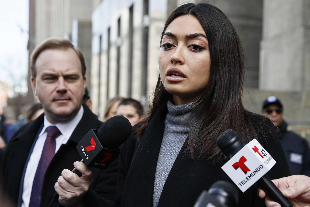 Ambra Battilana Gutierrez speaks to reporters outside of a Manhattan courthouse after Harvey Weinstein was convicted in his rape trial, Monday, Feb. 24, 2020, in New York. A jury convicted Weinstein of rape and sexual assault. The jury found him not guilty of the most serious charge, predatory sexual assault, which could have resulted in a life sentence. (John Minchillo, AP Photo)