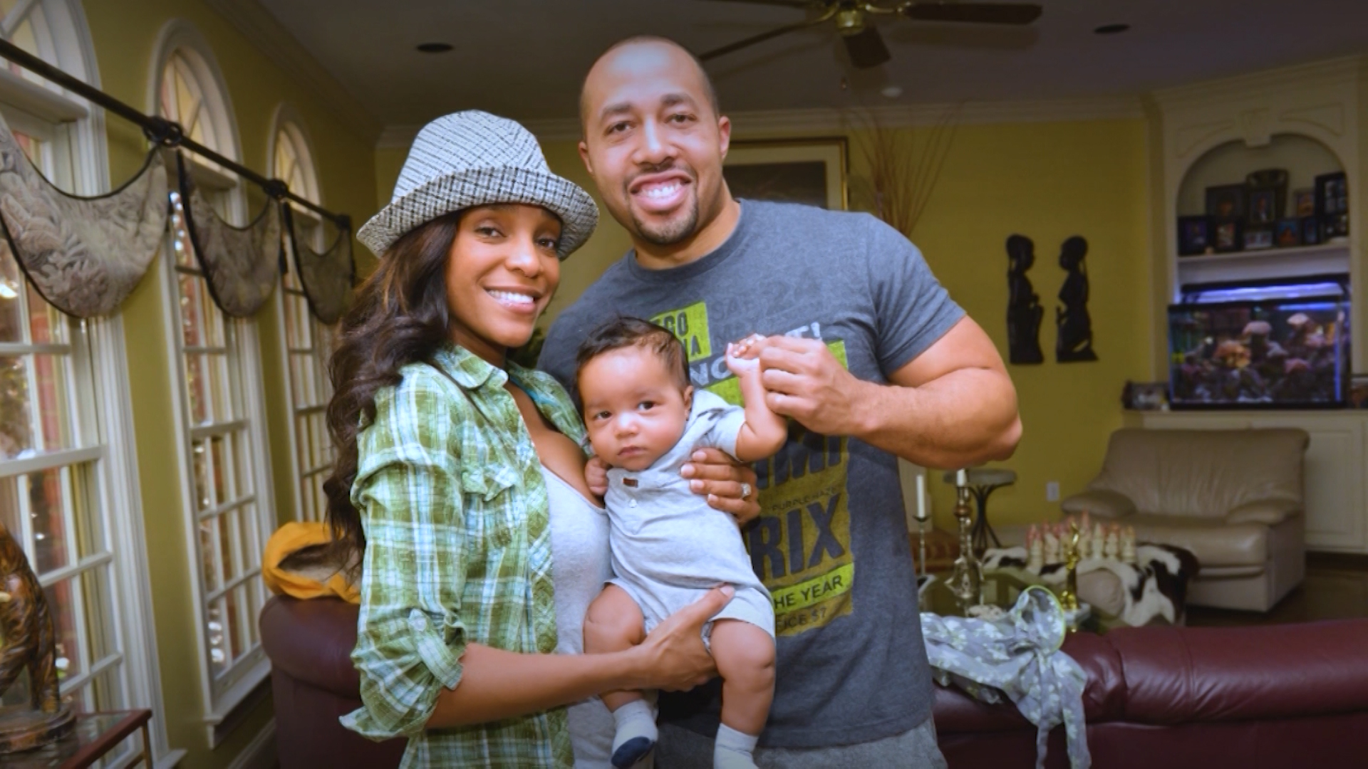 Charles Johnson with his late wife Kira Johnson and child. (Photo: Courtesy of Charles Johnston)