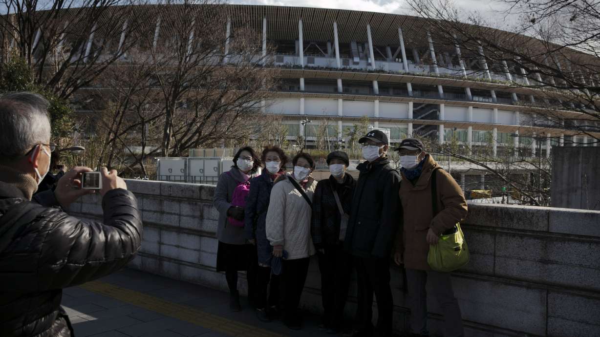 Tokyo organizers, government take offensive on virus threat