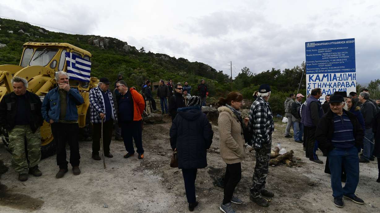 Greek island residents protest for 4th day over migrant plan