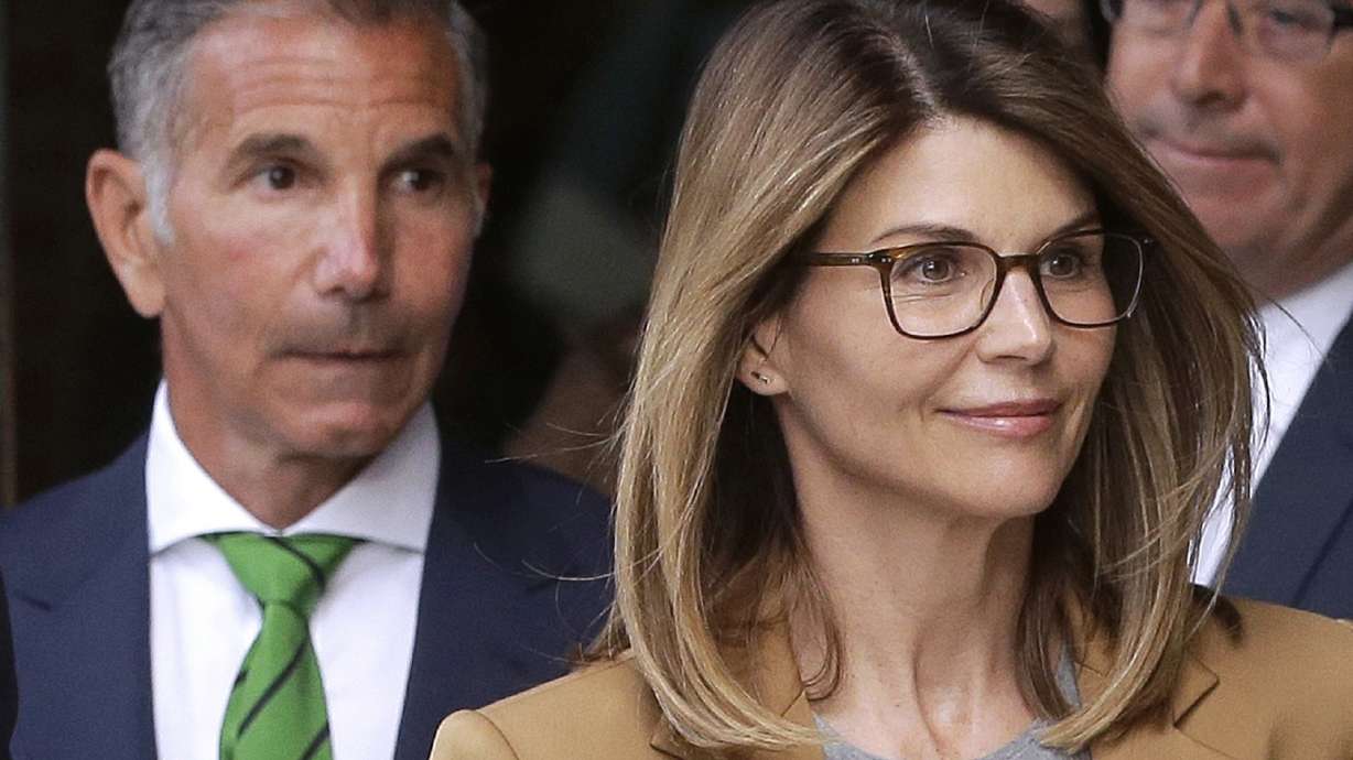 Loughlin, Giannulli set for October trial in college scam