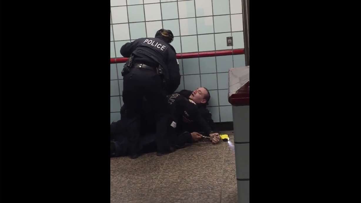 Charges dropped against man shot by Chicago cop at station