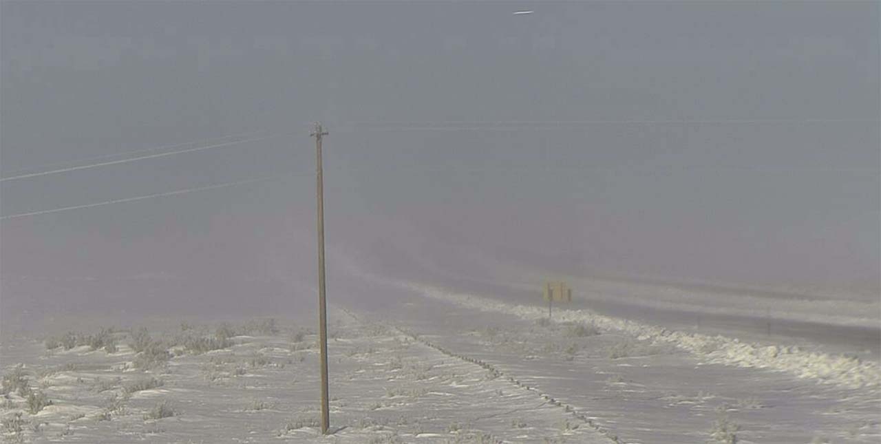 Snowy Wyoming highway pileup kills 3, injures dozens