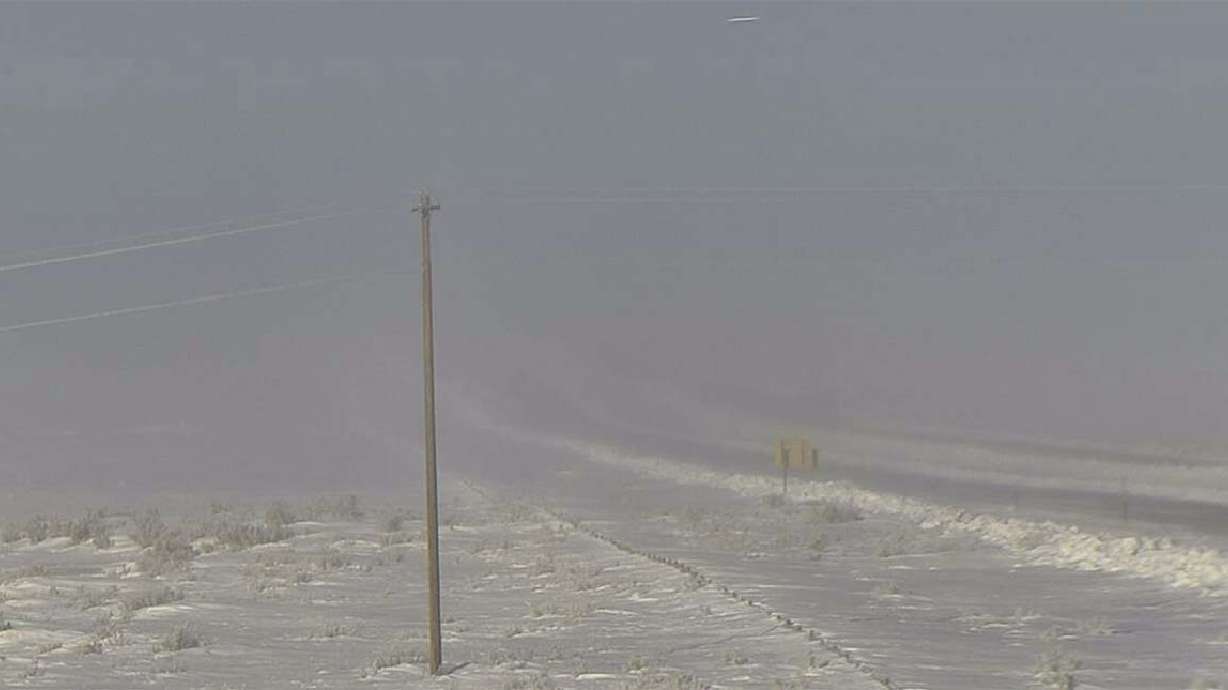 Snowy Wyoming highway pileup kills 3, injures dozens