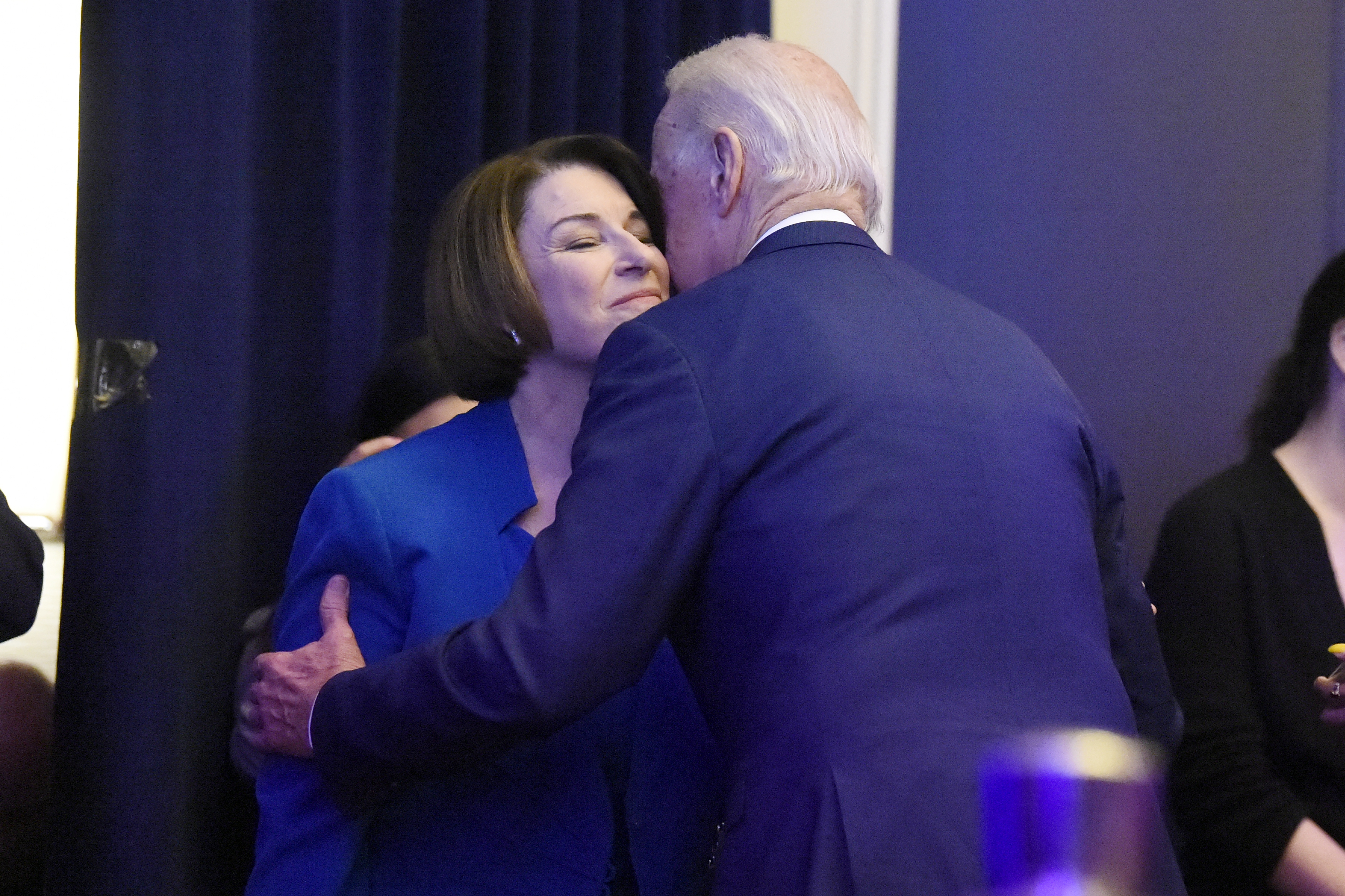 FILE - In this Feb. 24, 2020 photo, file photo Democratic presidential candidates Joe Biden and U.S, Sen. Amy Klobuchar, D-Minn. greet at a South Carolina Democratic Party dinner in Charleston, S.C. Klobuchar ended her Democratic presidential campaign on Monday, March 2, and endorsed rival Biden in an effort to unify moderate voters behind the former vice president's White House bid. (Meg Kinnard, AP Photo, File)