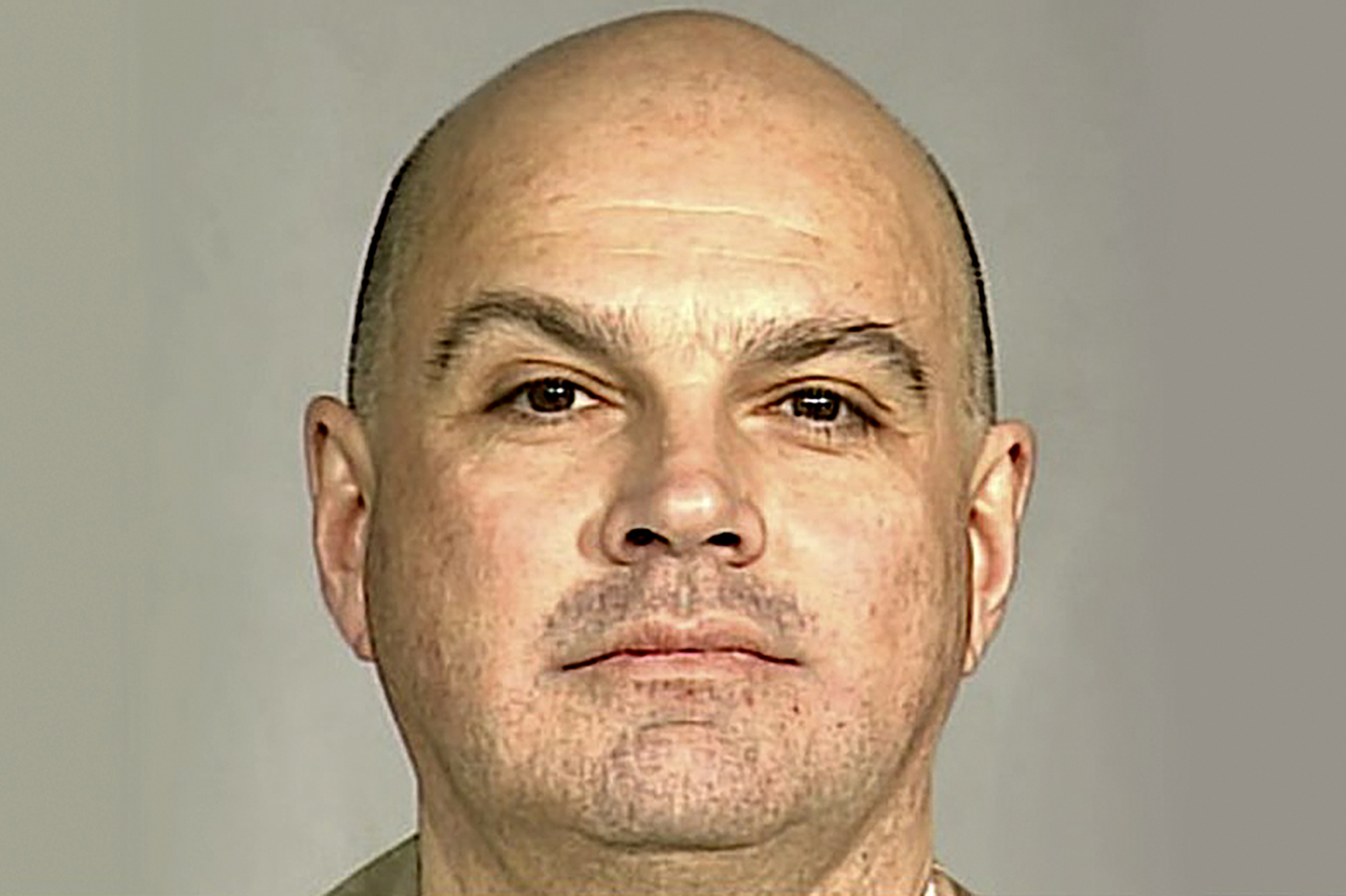 Prosecutor: Ex-convict was in bed with victim when arrested