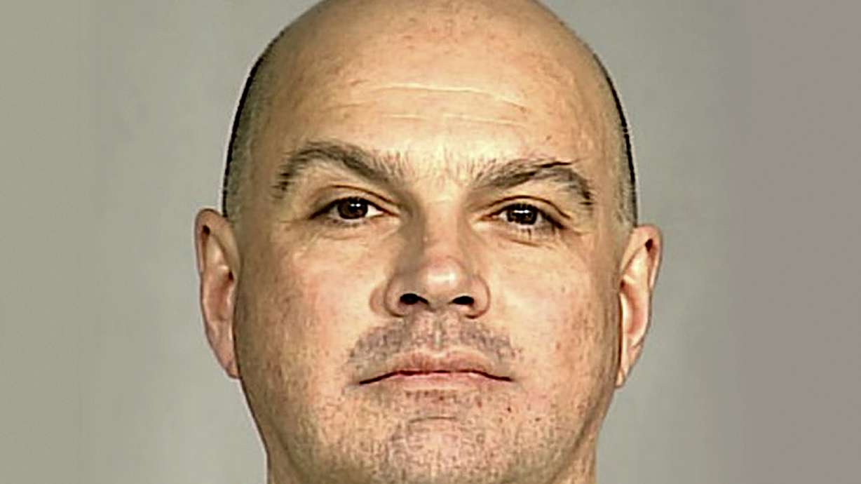 Prosecutor: Ex-convict was in bed with victim when arrested