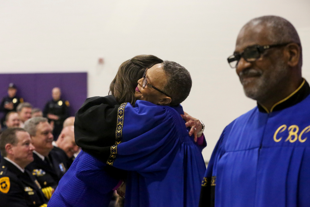 Salt Lake City Mayor Erin Mendenhall hugs Lara Eady Popwell, of the Calvary Baptist Choir, following the mayor’s State of the City address at the Meadowlark Elementary School in Salt Lake City on Monday, March 2, 2020. (Photo: Ivy Ceballo, KSL)