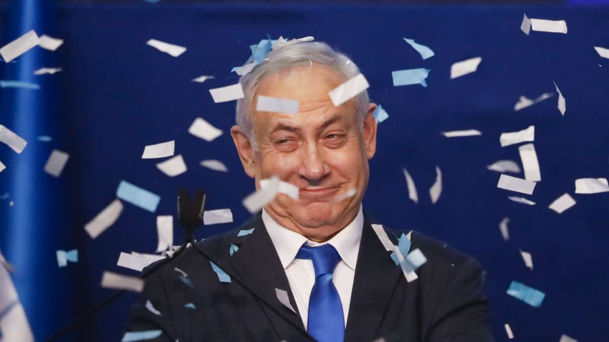 Exit polls: Netanyahu short of majority in Israel vote
