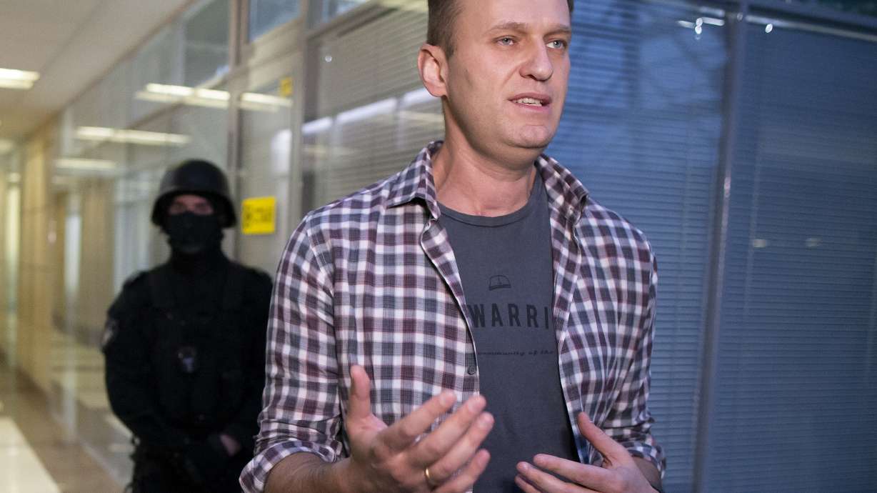 Russia freezes bank accounts of opposition leader, family