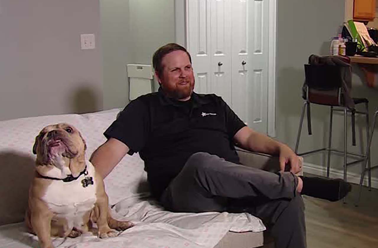 Scott Strahan's wife, who is pregnant, can’t travel back to Utah anytime soon due to visa delays related to the coronavirus. Photo: KSL TV