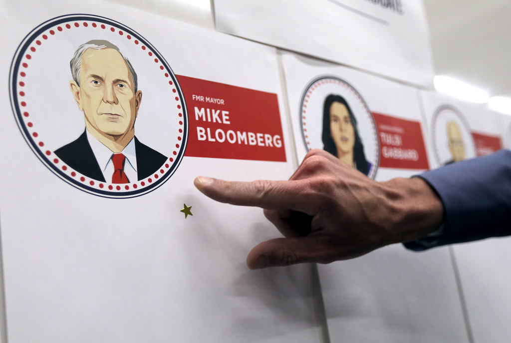 Matt Bradley marks his vote for Mike Bloomberg with a sticker during a Super Tuesday election watch party at the Hinckley Institute of Politics in Salt Lake City on Tuesday, March 3, 2020. (Photo: Kristin Murphy, KSL)