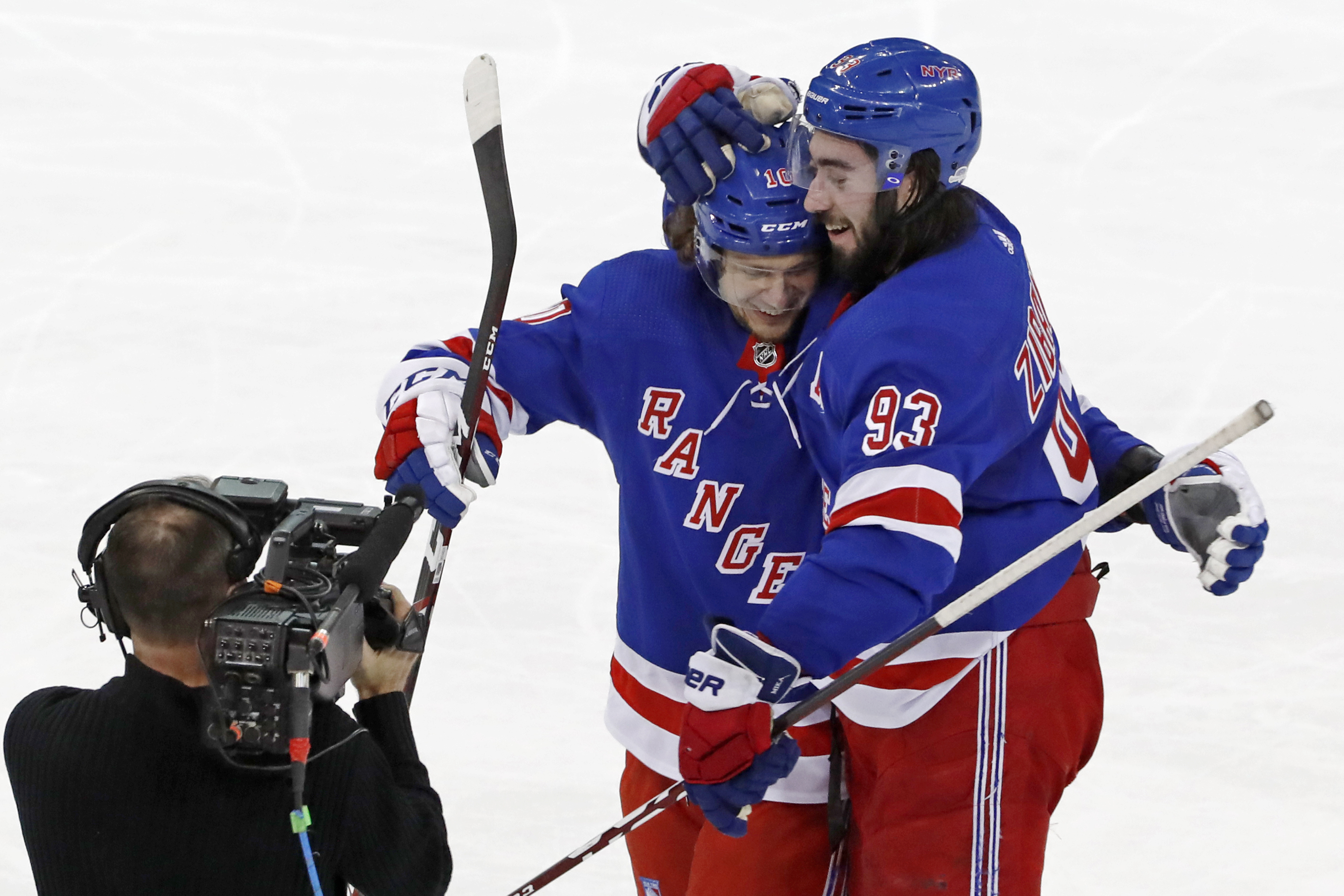 Zibanejad scores 5 goals to lead Rangers past Caps in OT