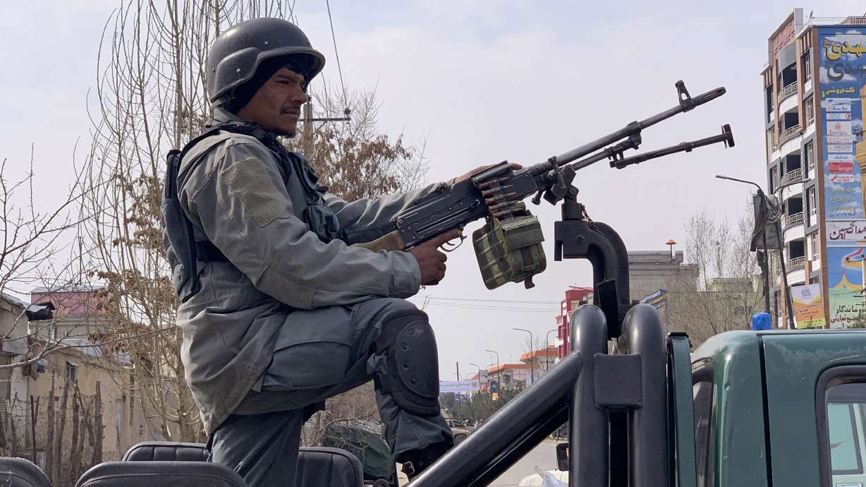 Officials say gunmen kill 32 at ceremony in Afghan capital