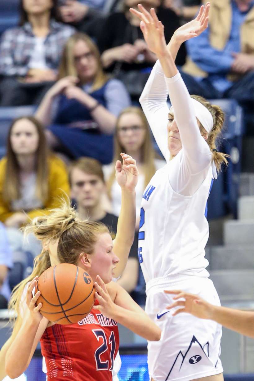 BYU Cougars center Sara Hamson (22) attempts to block Saint Mary's Gaels forward Sam Simons (21) at the Marriott Center in Provo on Thursday, Feb. 13, 2020. (Photo: Ivy Ceballo, KSL)