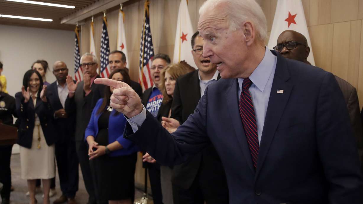 Biden invokes Obama, swipes at Sanders with six-state ad buy