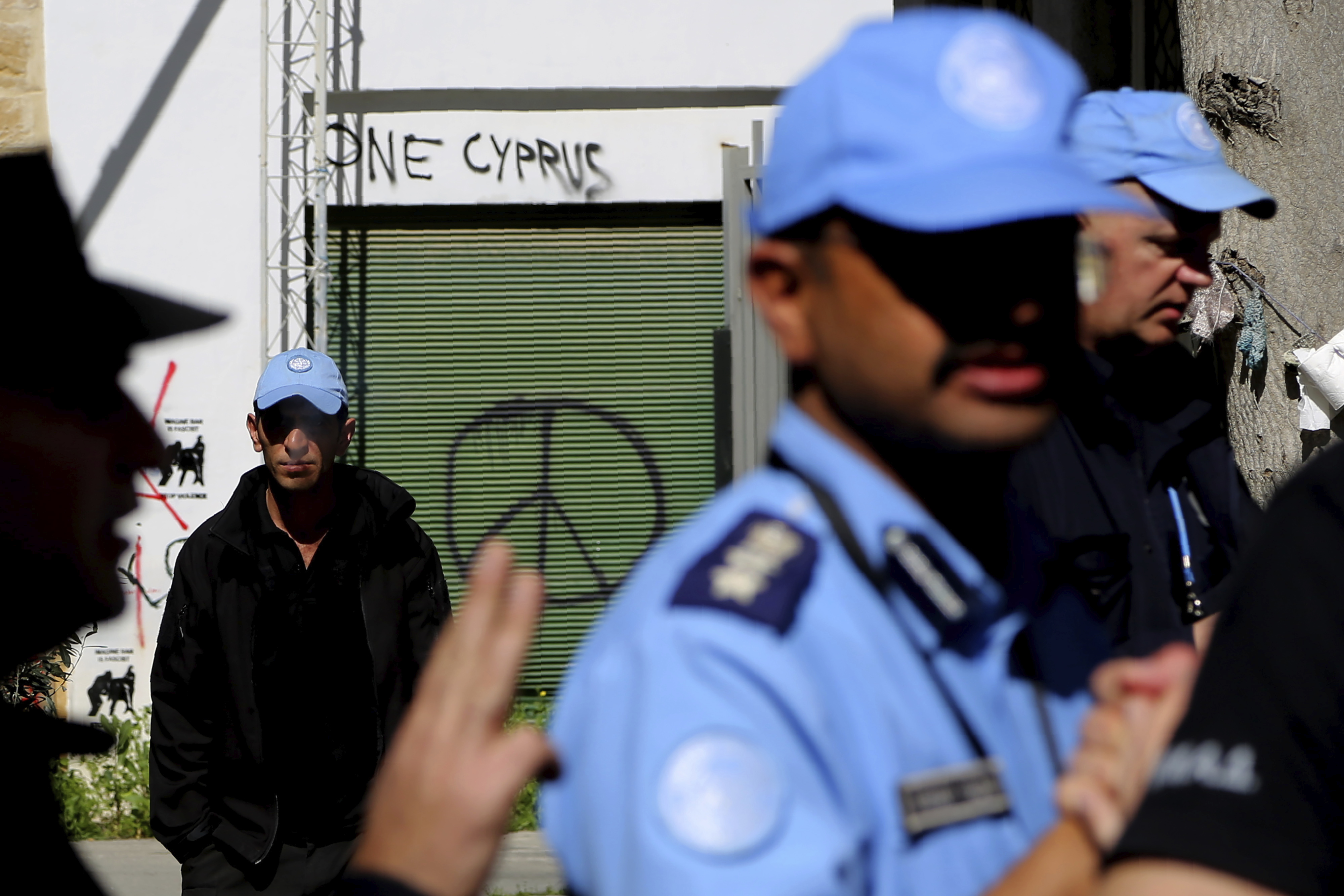 Cyprus police pepper spray protesters at shut crossing point