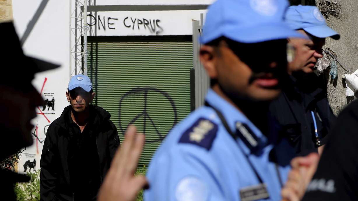 Cyprus police pepper spray protesters at shut crossing point