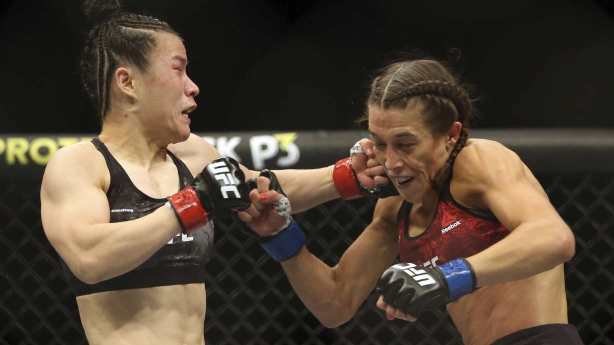 Zhang Weili, Israel Adesanya keep title belts at UFC 248