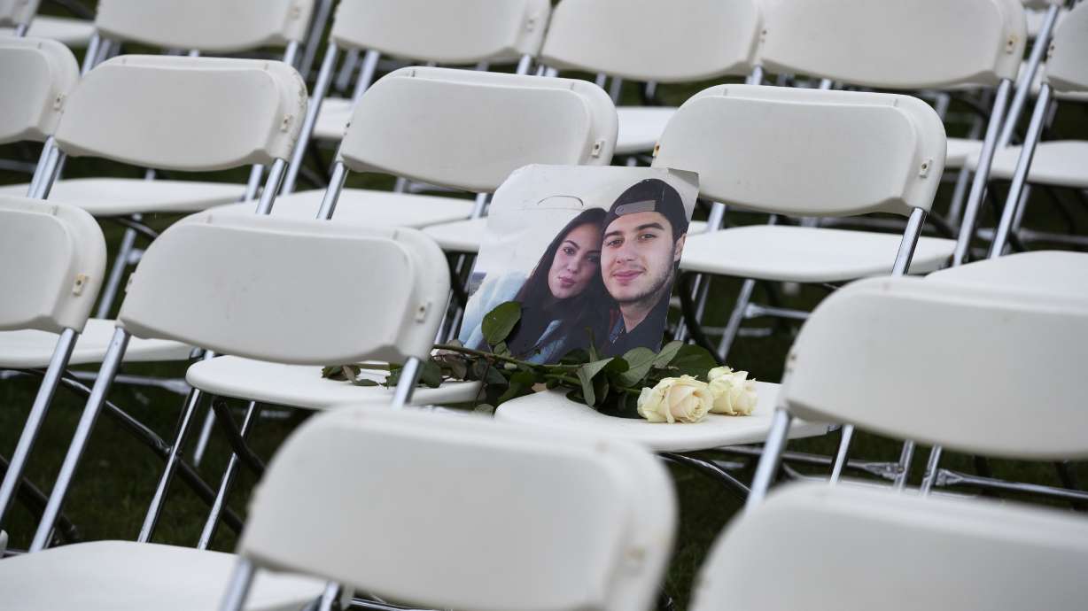 MH17 relatives protest against Russia with 298 empty chairs