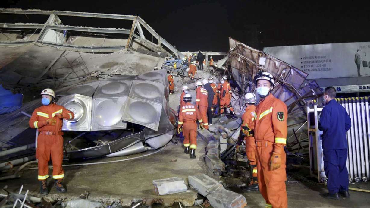10 dead, 23 missing as hotel in China virus fight collapses