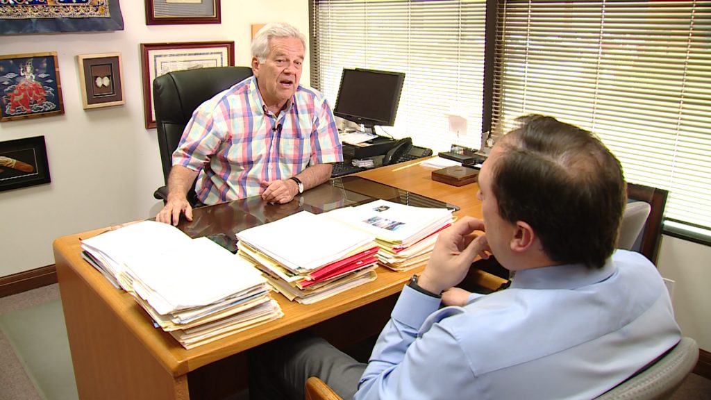 Larry Gelwix of Columbus Travel explains the “Cancel for any Reason” waiver for travel insurance in Bountiful Friday, March 6, 2020. Photo: KSL TV