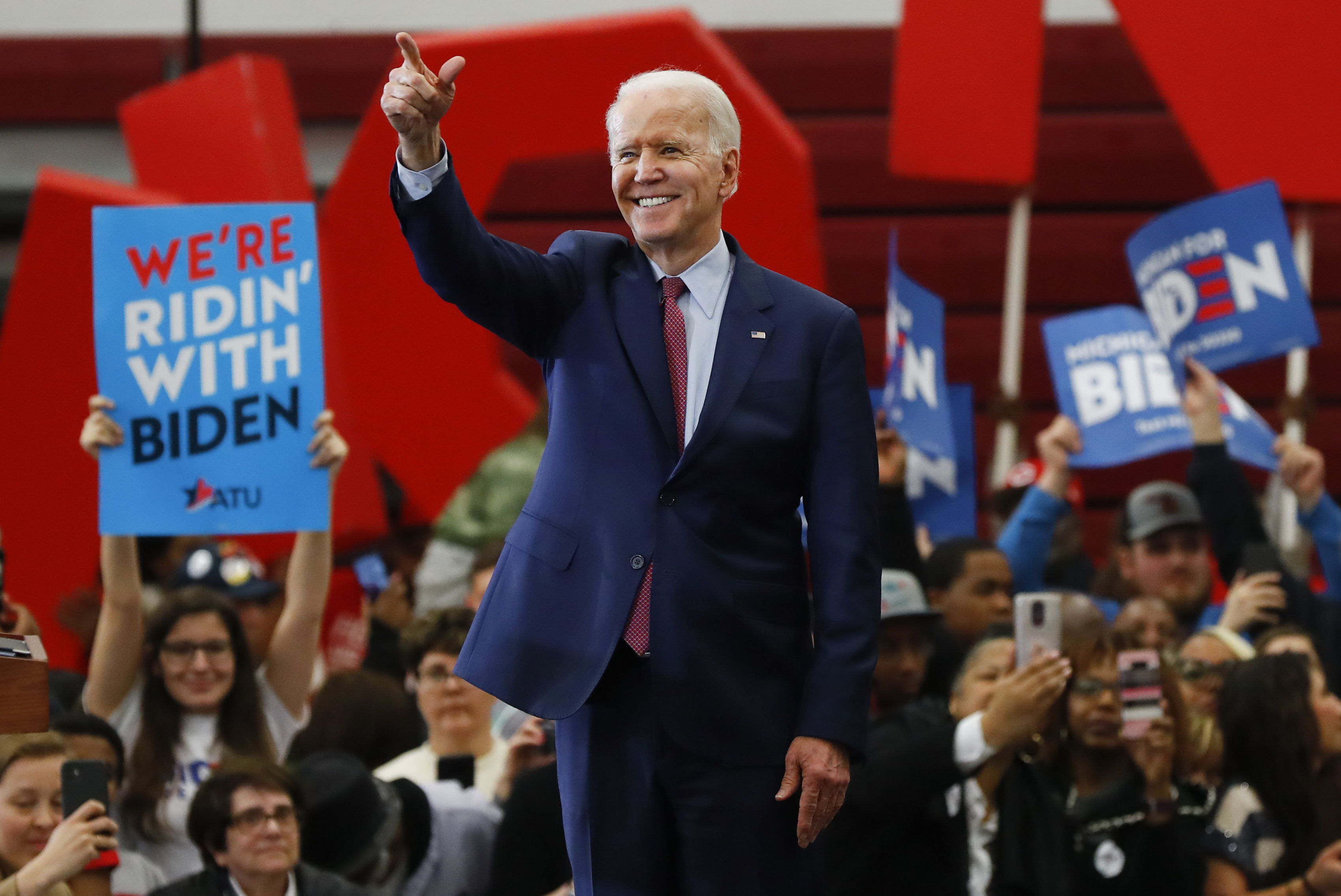 The Latest: Biden faces down pro-gun worker at Detroit plant