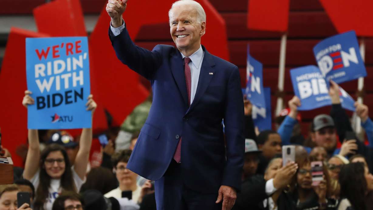 The Latest: Biden faces down pro-gun worker at Detroit plant