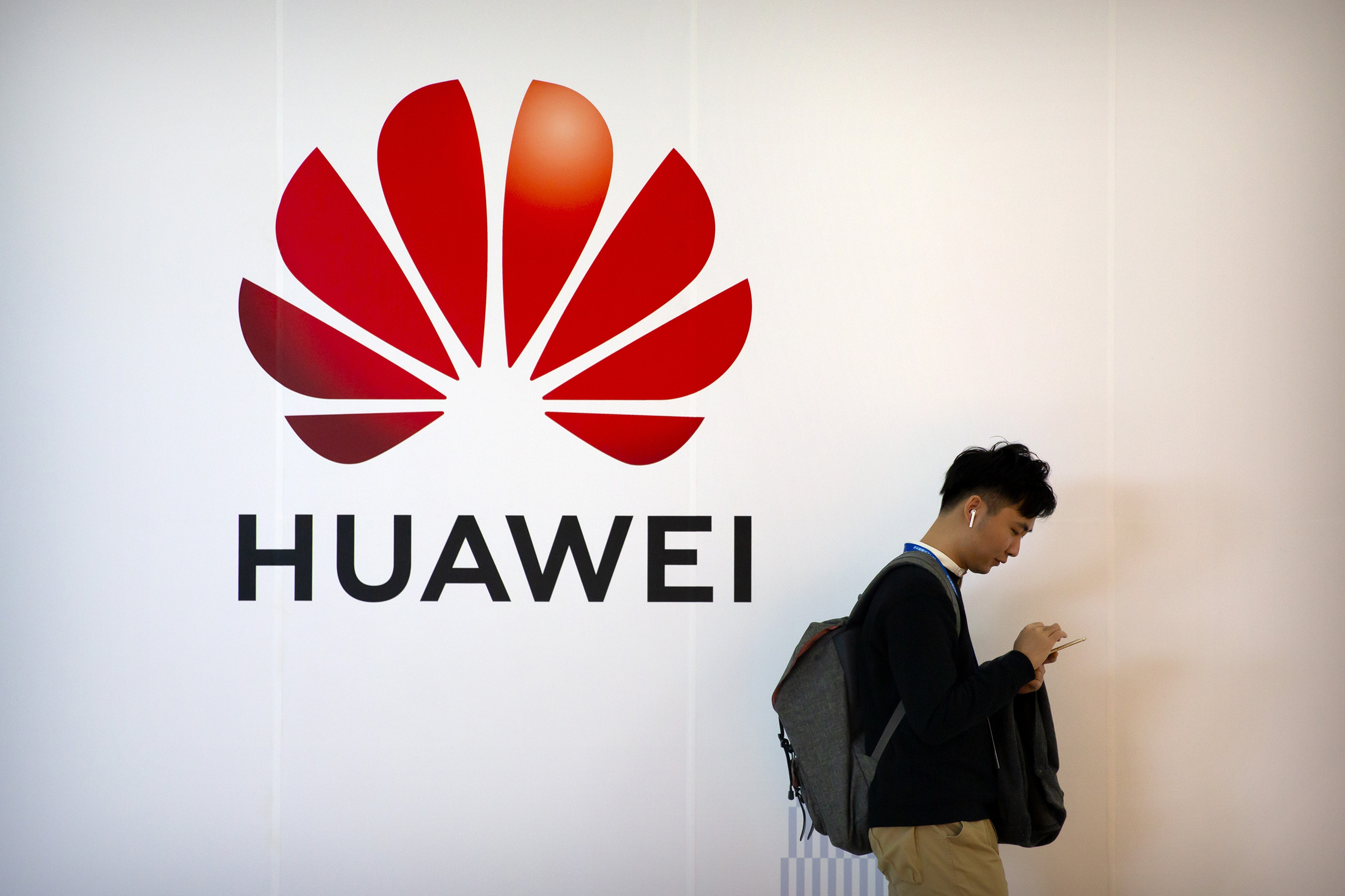 UK lawmakers challenge government over 'high risk' Huawei