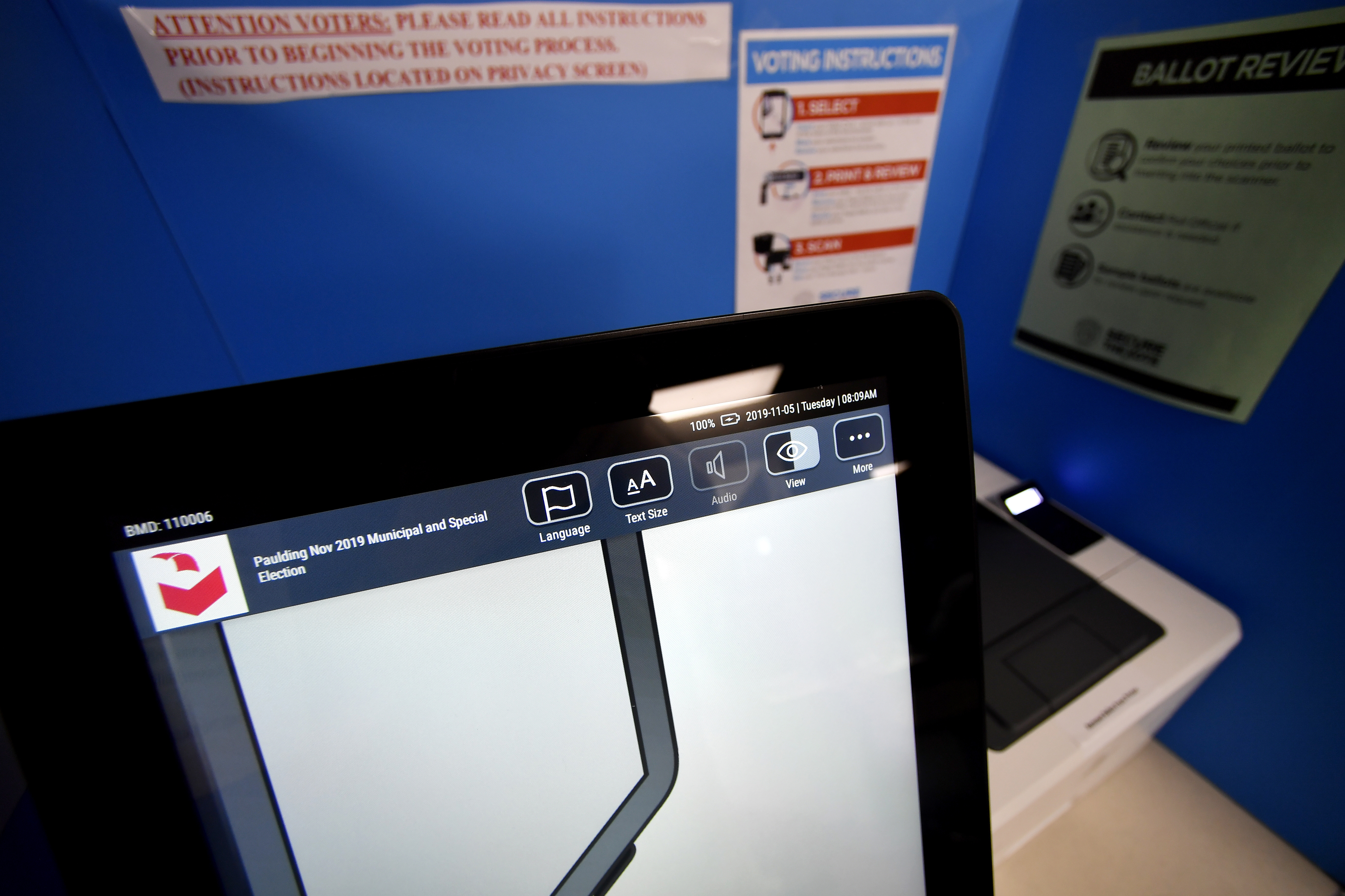 Georgia county punished for ditching voting machines
