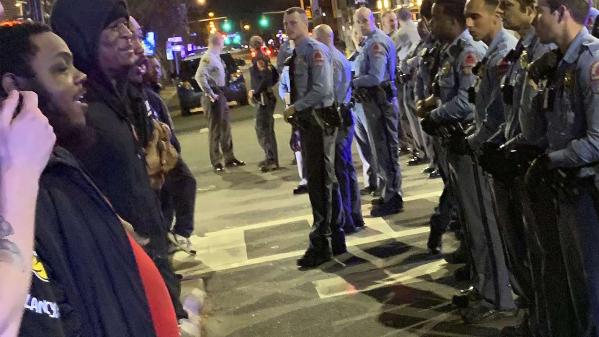 After police shoot him, North Carolina man faces charges