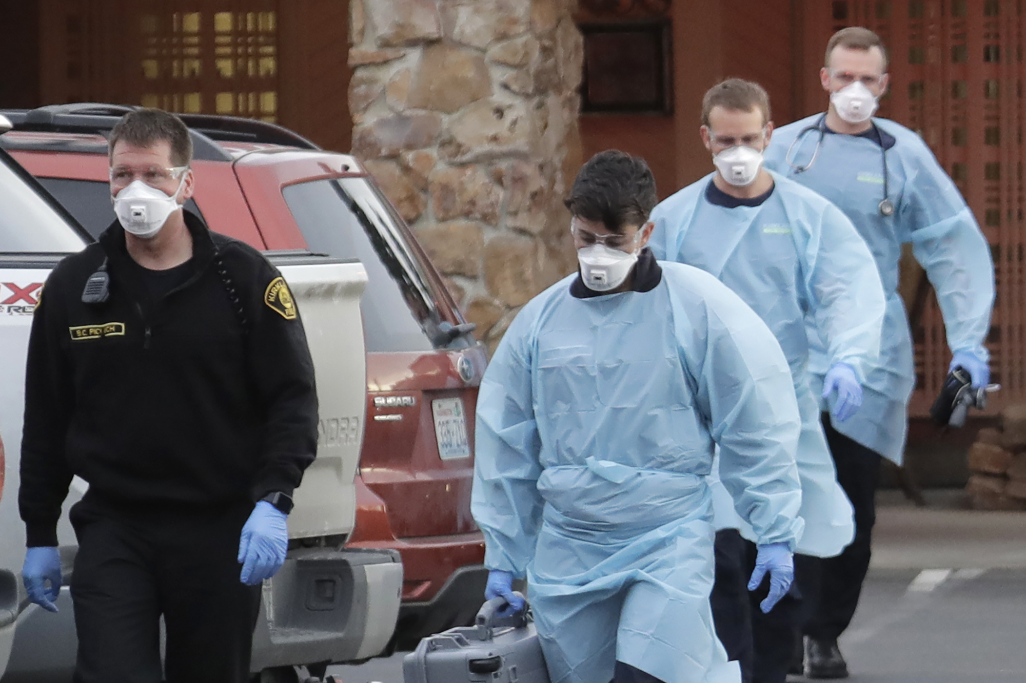 Americans snap to attention on virus as big events canceled