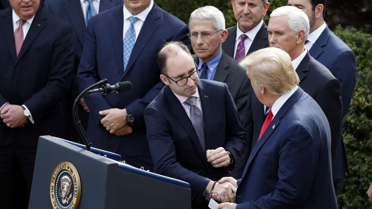 Despite coronavirus, Trump keeps shaking hands