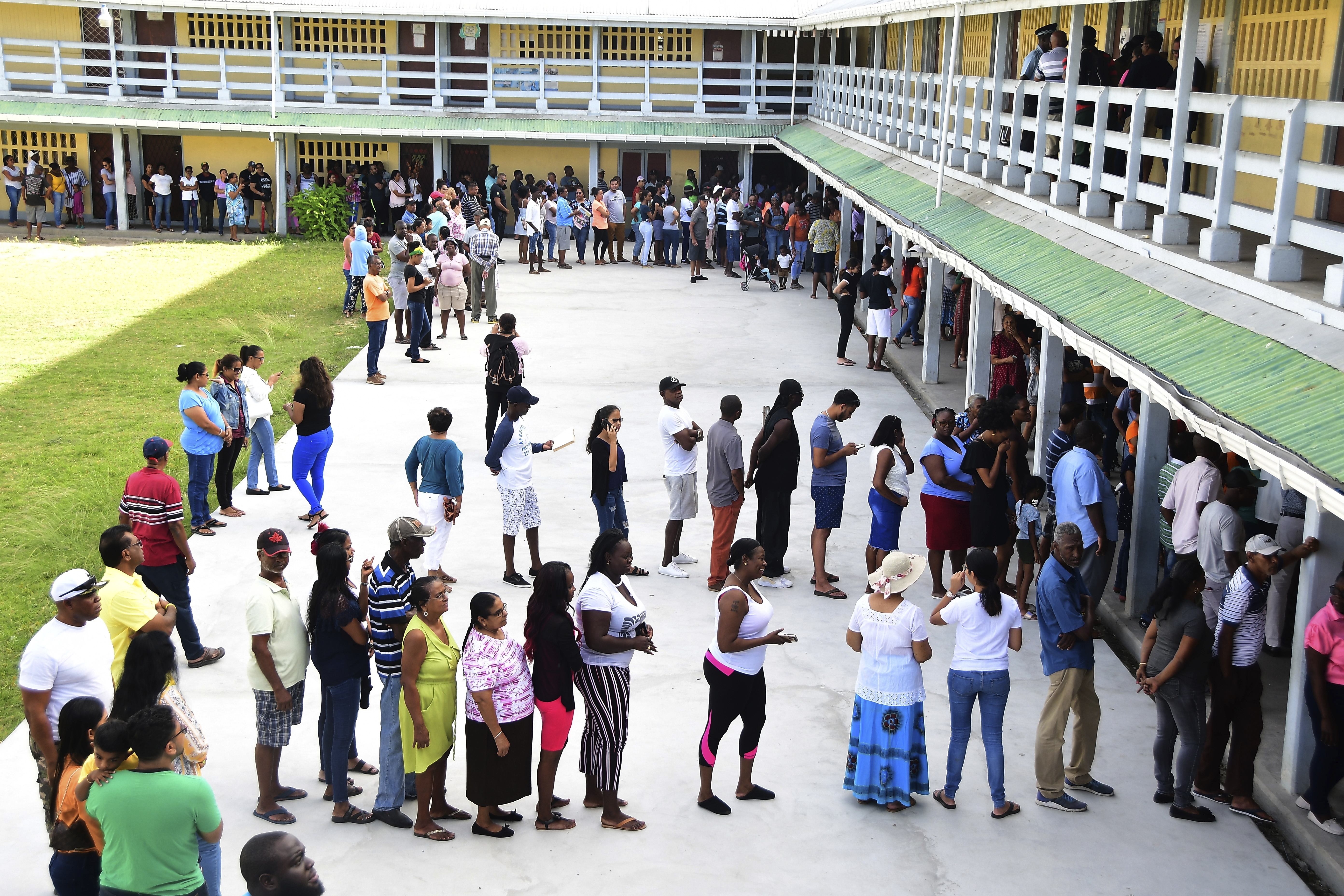 Guyana's governing group is declared winner in disputed vote