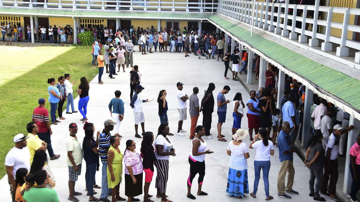 Guyana's governing group is declared winner in disputed vote