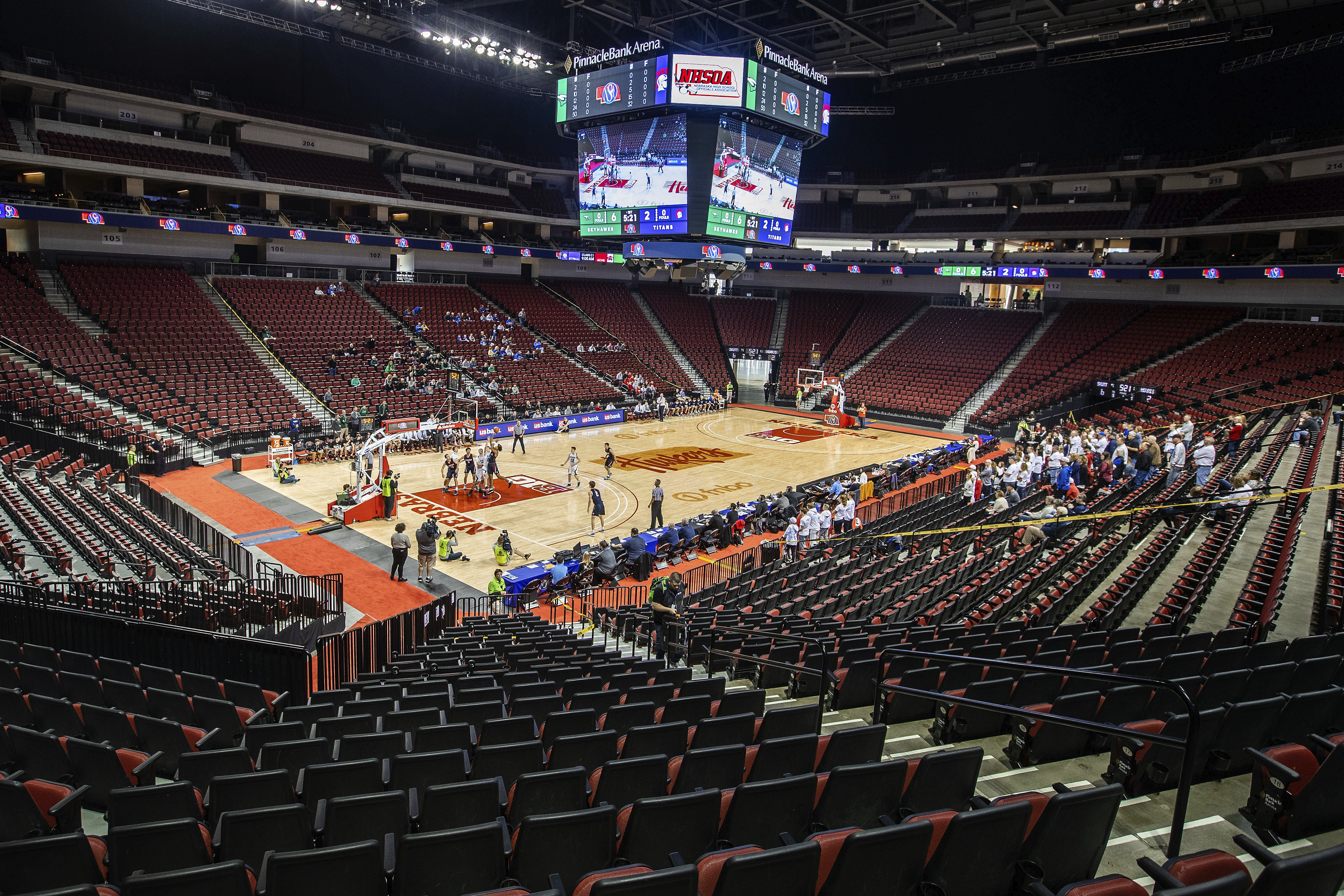 Omaha Skutt takes on Norris during the first day of the Nebraska boys state high school basketball tournament at Pinnacle Bank Arena Thursday, March 12, 2020, in Lincoln, Neb. The fans were restricted to staff and immediate family members due to concerns over the coronavirus. (Photo: Chris Machian, Omaha World-Herald via AP.