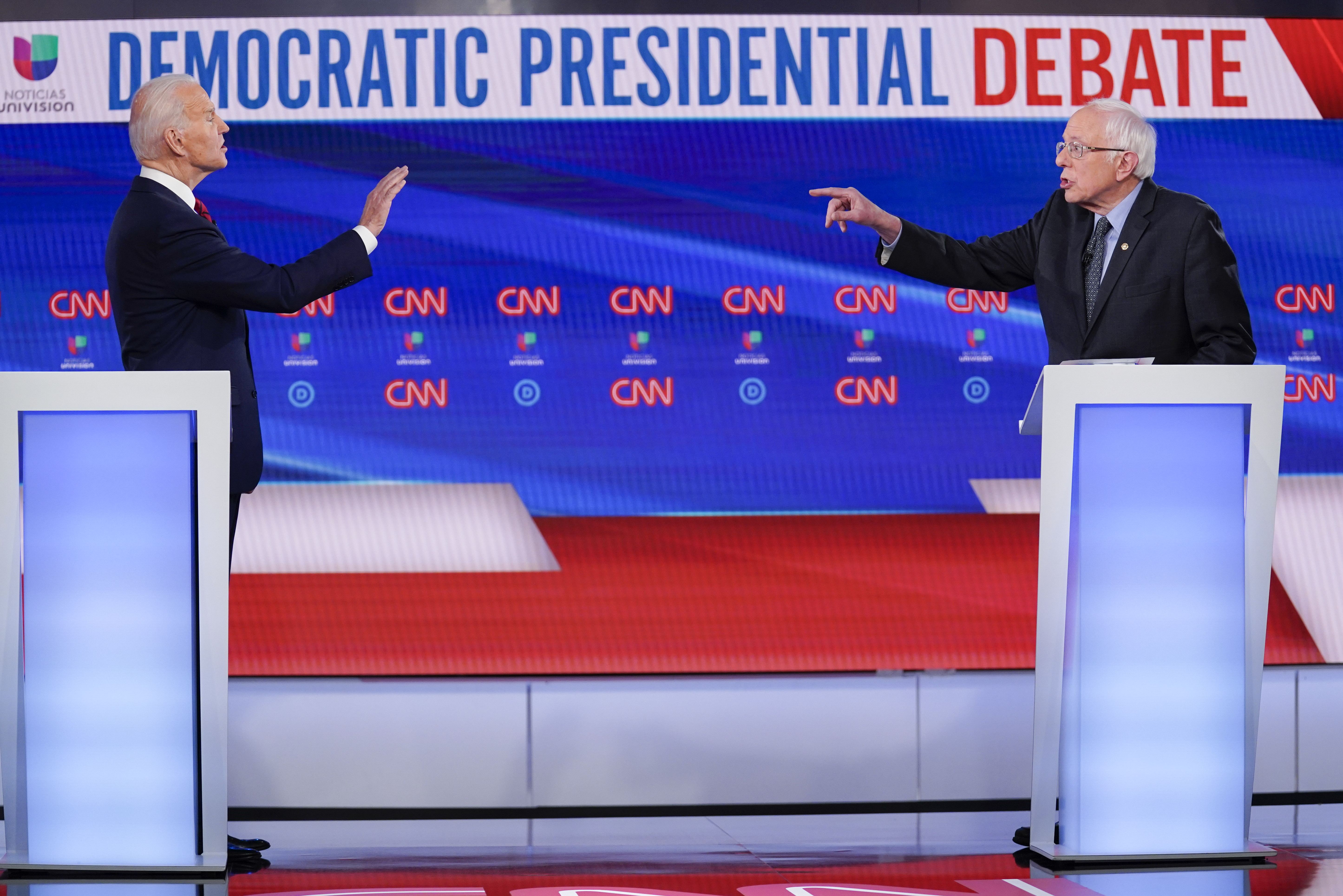 Biden says Americans want 'results, not a revolution' in debate with Sanders
