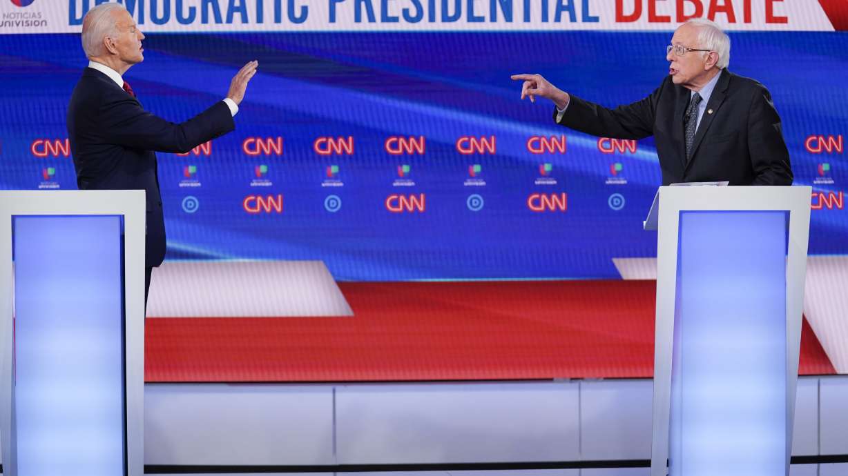 Biden says Americans want 'results, not a revolution' in debate with Sanders