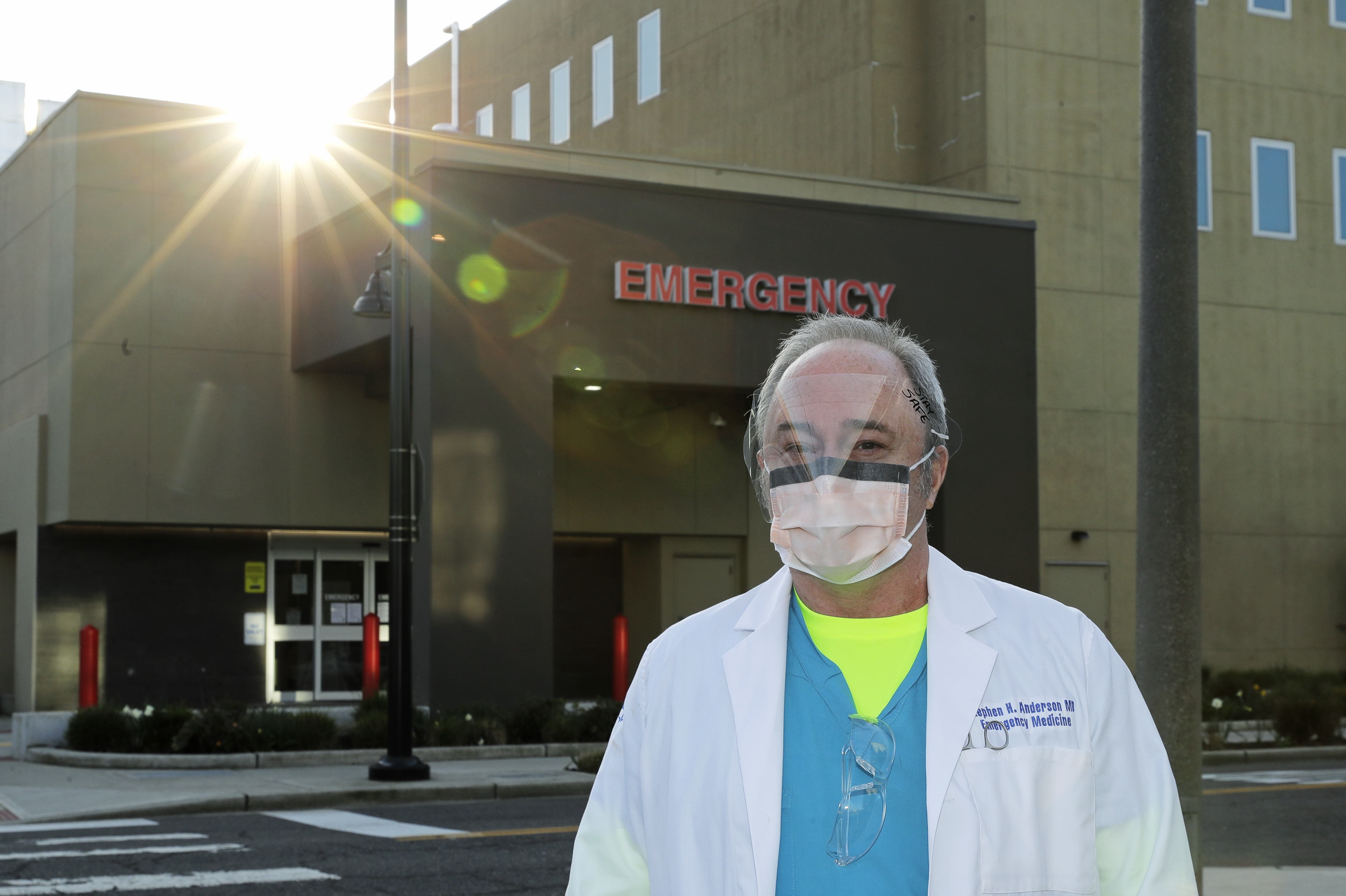 One mask a day for doctors in virus epicenter of Washington