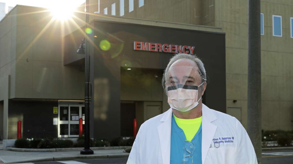 One mask a day for doctors in virus epicenter of Washington