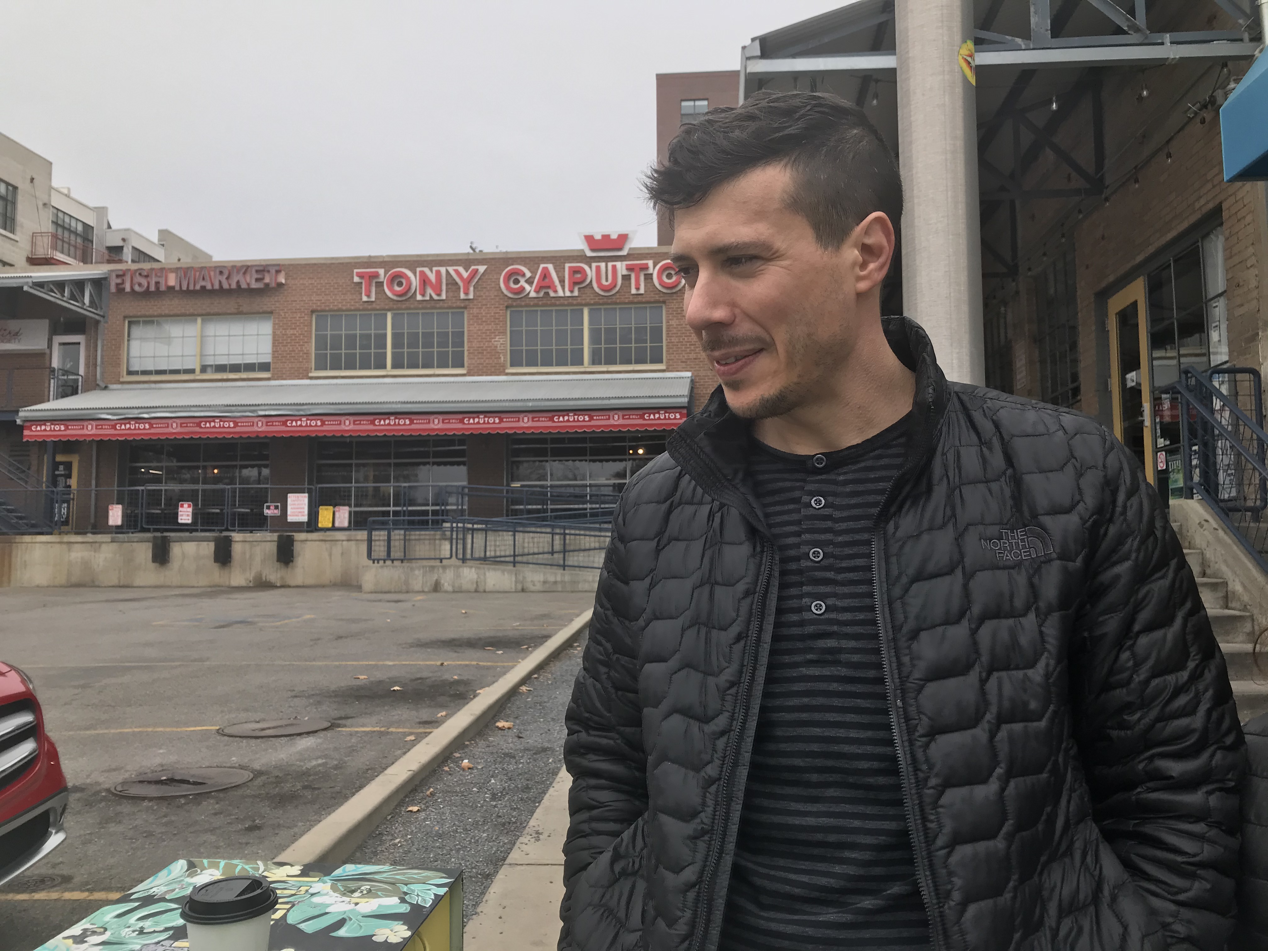 Matt Caputo stands outside his family’s shop and restaurant on Wednesday, March 19, 2020, after an earthquake toppled $10,000 in gourmet bottled goods, smashing them on the floor. (Photo: Annie Knox, KSL)