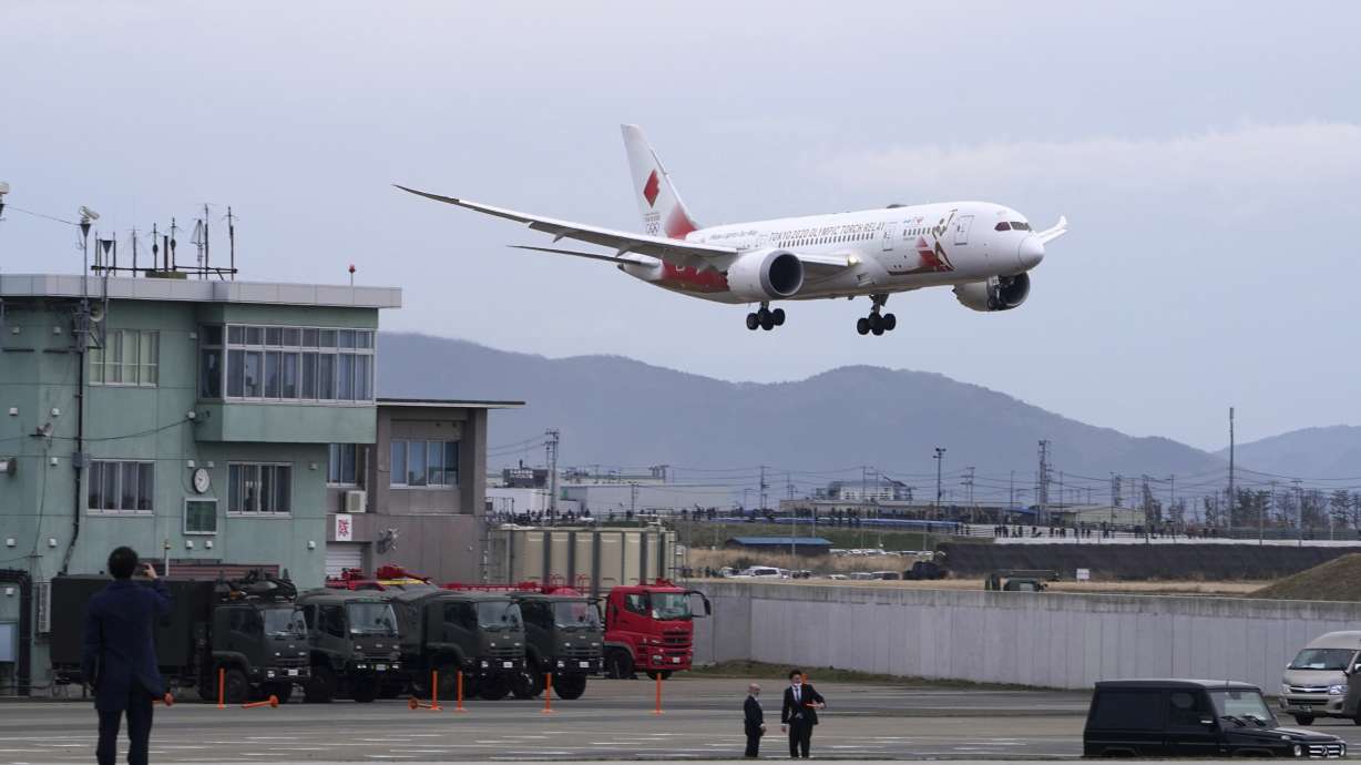 Olympic flame lands in Japan as doubts grow over Tokyo Games
