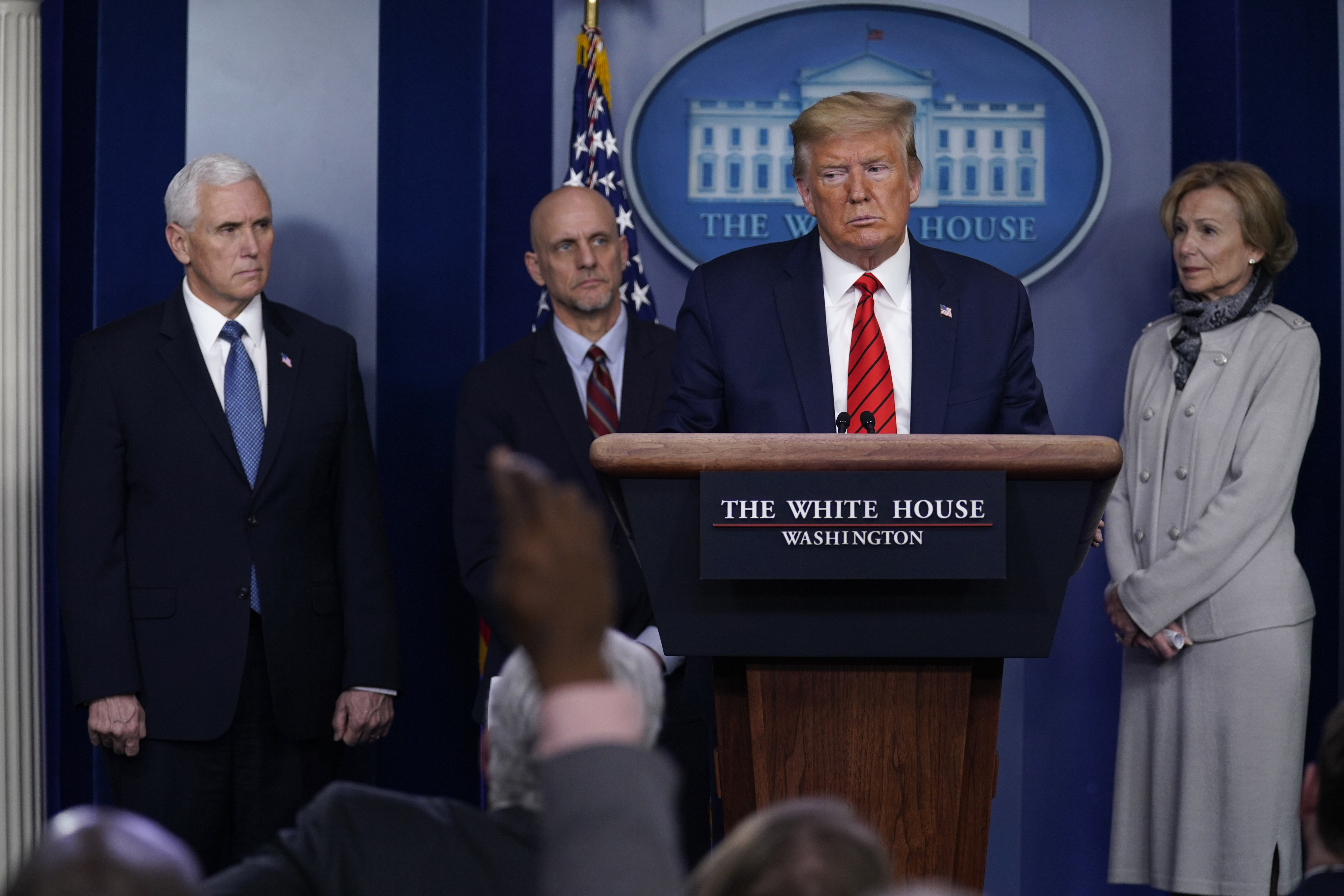 Coronavirus task force offers an even keel to a zigzag Trump