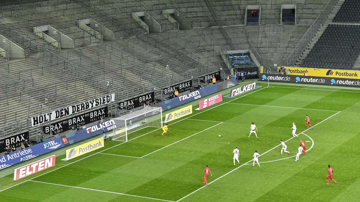 Germany leads the way on soccer salary cuts as virus hits