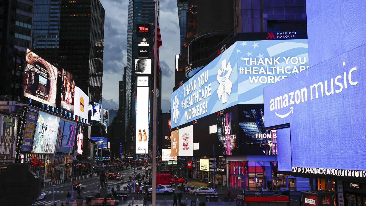 NY airports, hospitals feel pressure as virus alarms grow