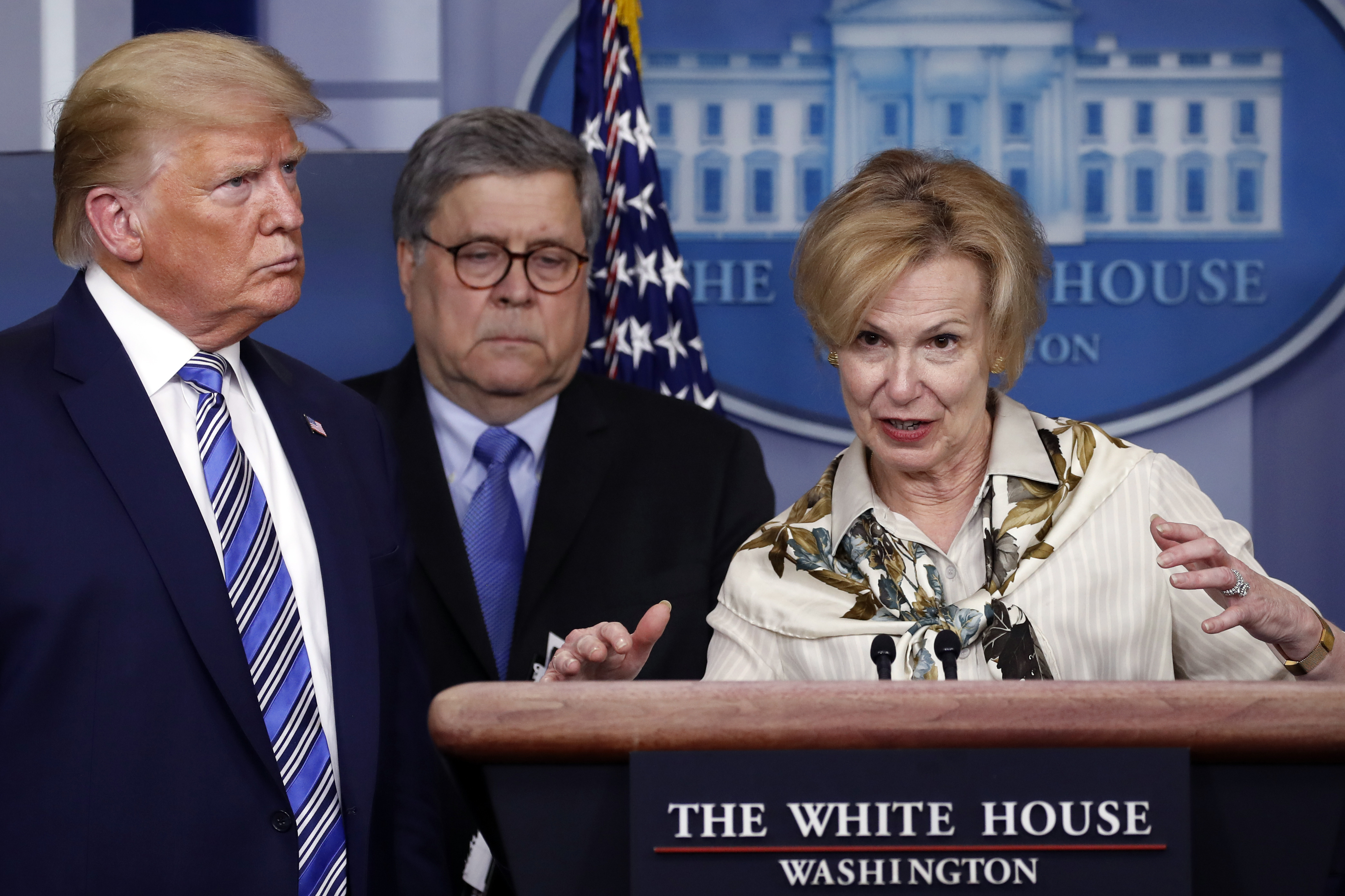 President Donald Trump and Attorney General William Barr listens as Dr. Deborah Birx, White House coronavirus response coordinator, speaks about the coronavirus in the James Brady Briefing Room, Monday, March 23, 2020, in Washington. (Alex Brandon, AP Photo)