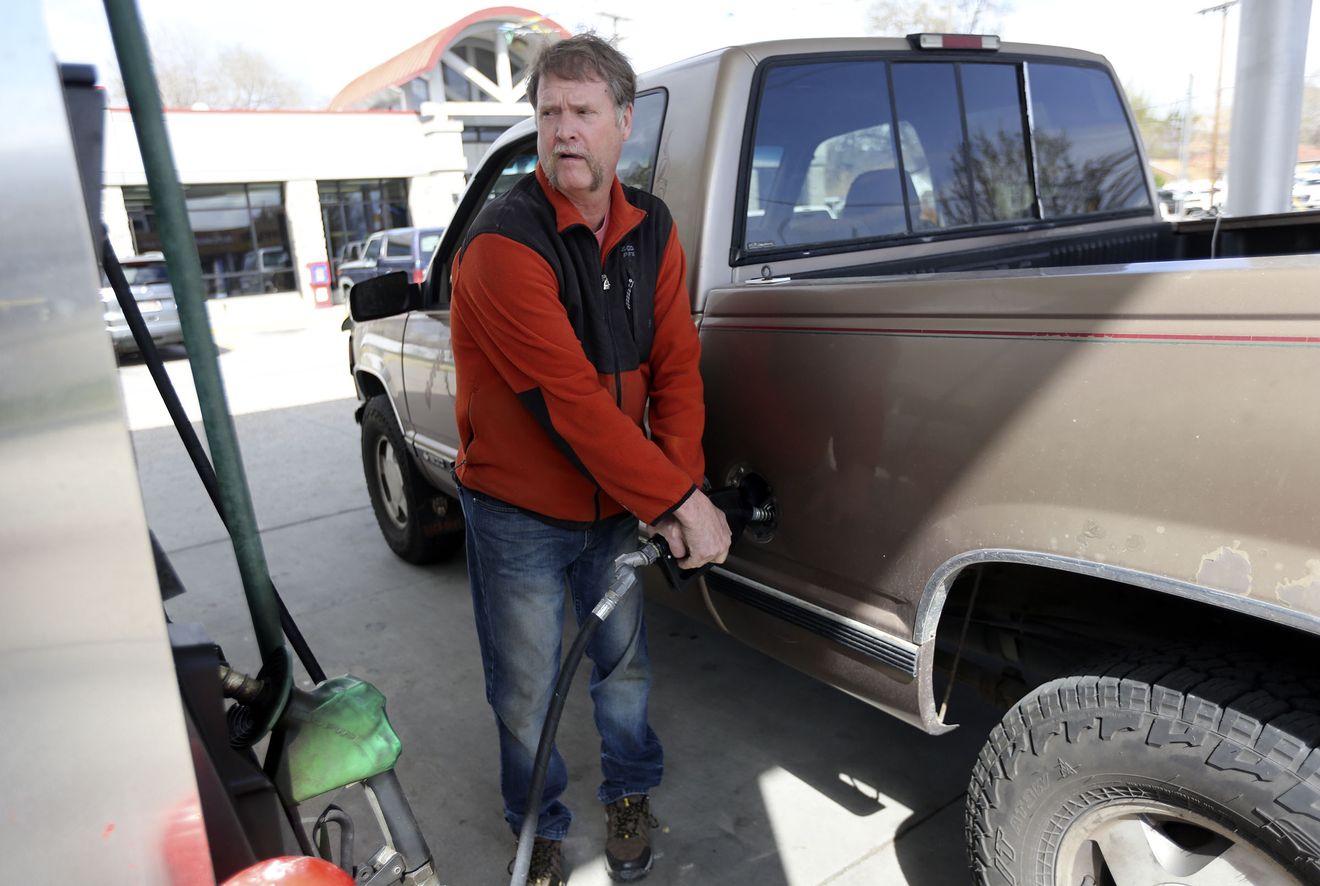 Steve Elder pumps gas at Shopper’s Express in Salt Lake City on Monday, March 23, 2020. (Photo: Kristin Murphy, KSL)