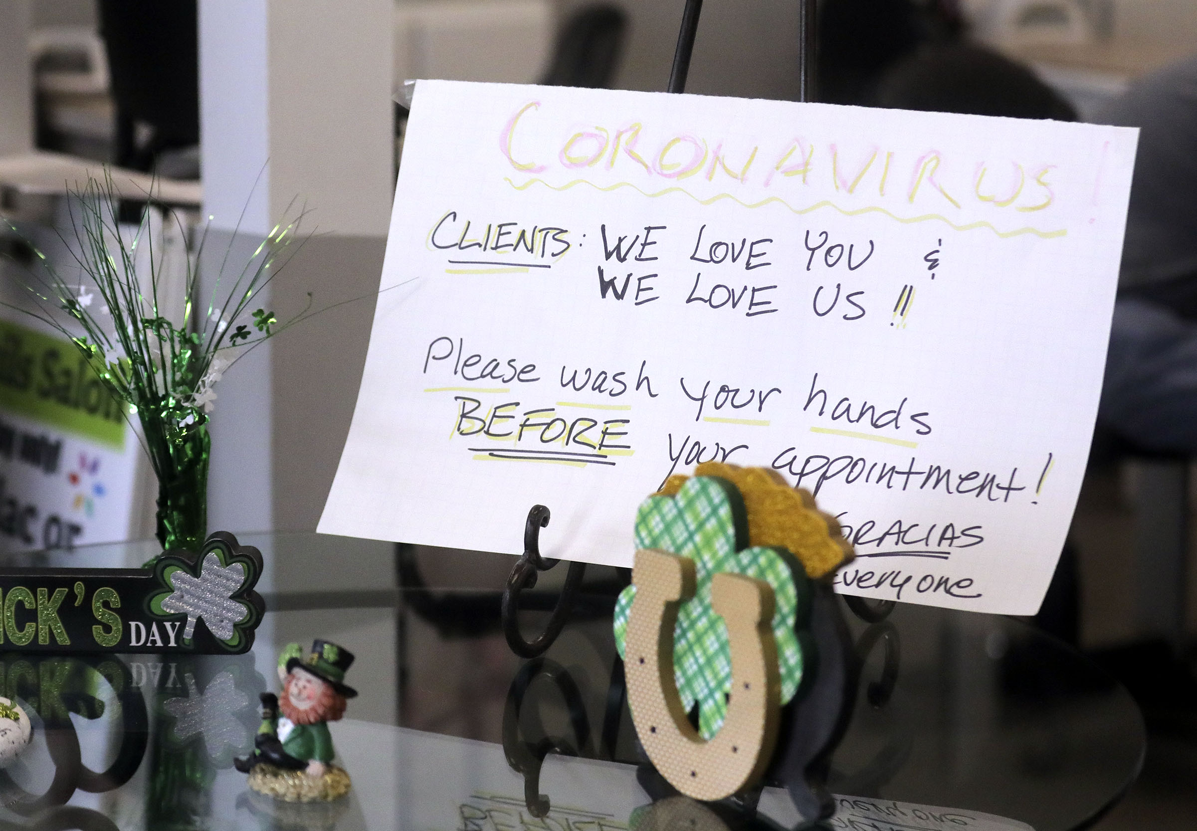 A sign at Color My Nails in Midvale on Wednesday, March 25, 2020, directs clients to wash their hands during the COVID-19 pandemic. Small businesses are struggling with a loss of business due to the novel coronavirus. (Kristin Murphy, KSL)